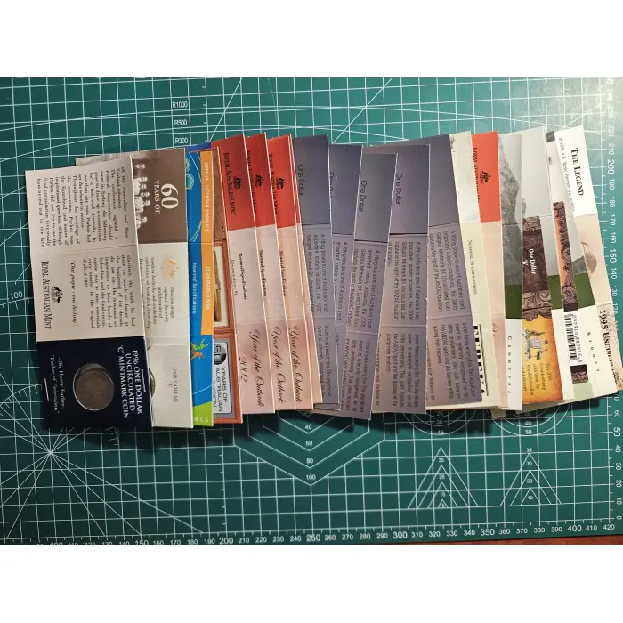 Bundle of 22 small $1- tri folds, mint mark, commemorative, remembrance 