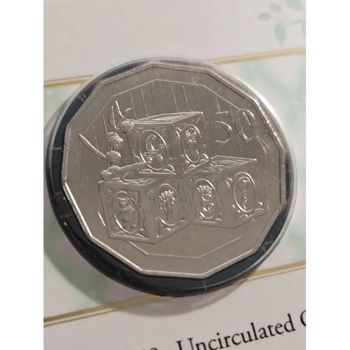 Bundle of wallet sized carded coins, 50 cent, $2- $5- commemorative 