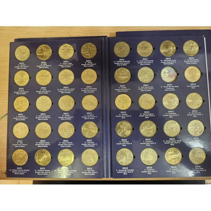 Australian $1- circulated collectors folders x 4