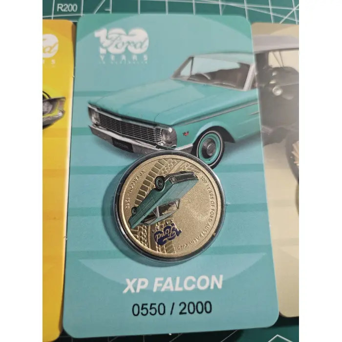 100 years of Ford $1- coloured carded coins