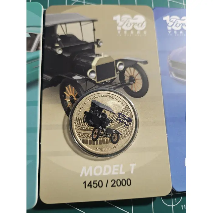 100 years of Ford $1- coloured carded coins