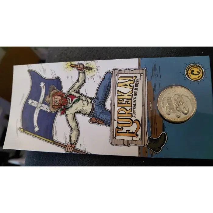 Eureka set up for grabs - $1 unc 'C' mint coin on card