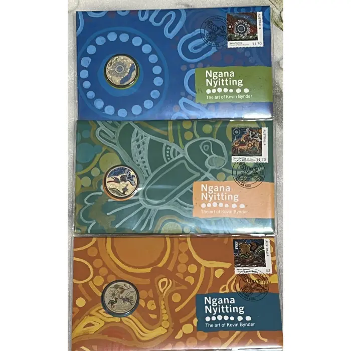 3 indigenous Ngana Nyitting PNCs of Colour $1 coins