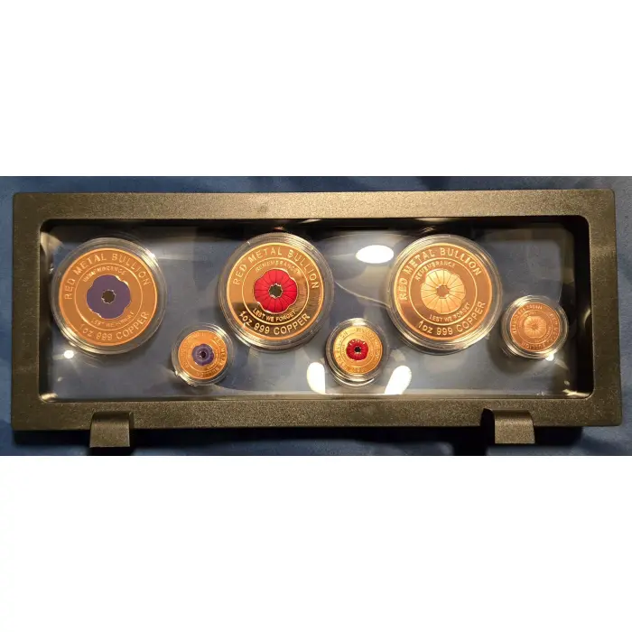 Red poppy copper bullion in stand up display. Purple poppy. Copper poppy.  3+ oz