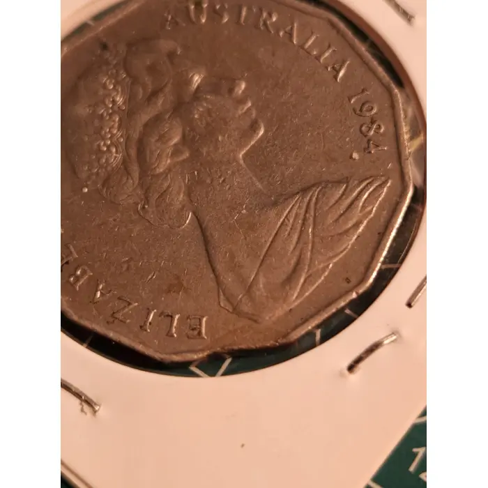 1984 COA 50 cent clipped planchet 