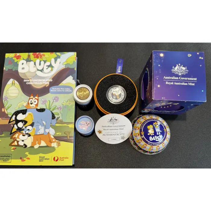 2025 $1 bluey christmas silver proof coin and 2026 $2 Coin Roll and folder Opene